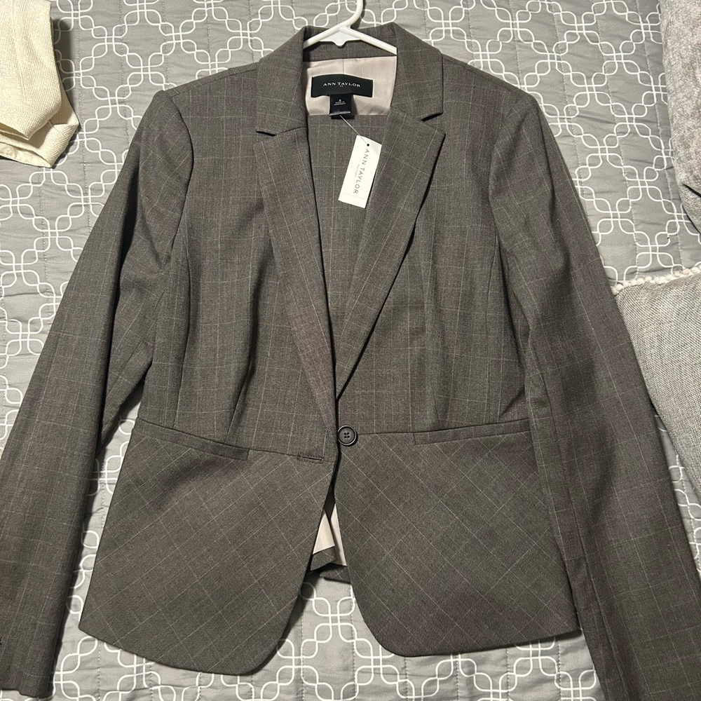 A two piece pant suit